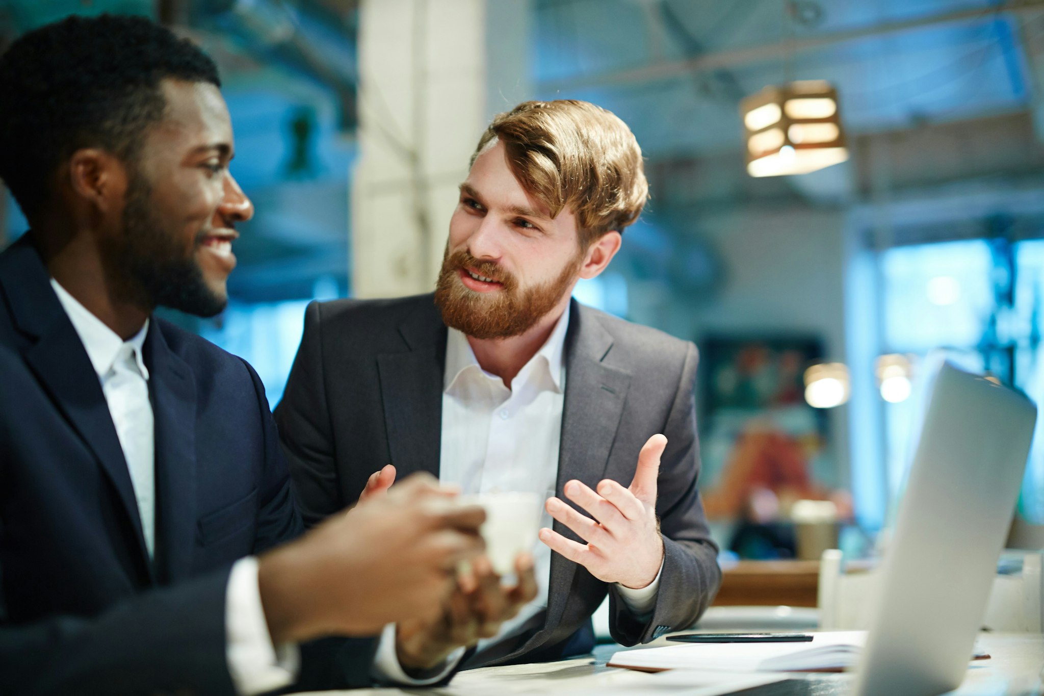 Two professionals discussing the Corporate Transparency Act