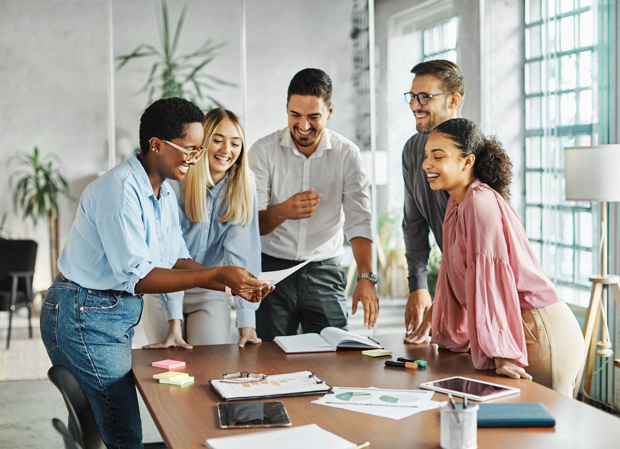A team collaborating effectively under a unified approach to GRC