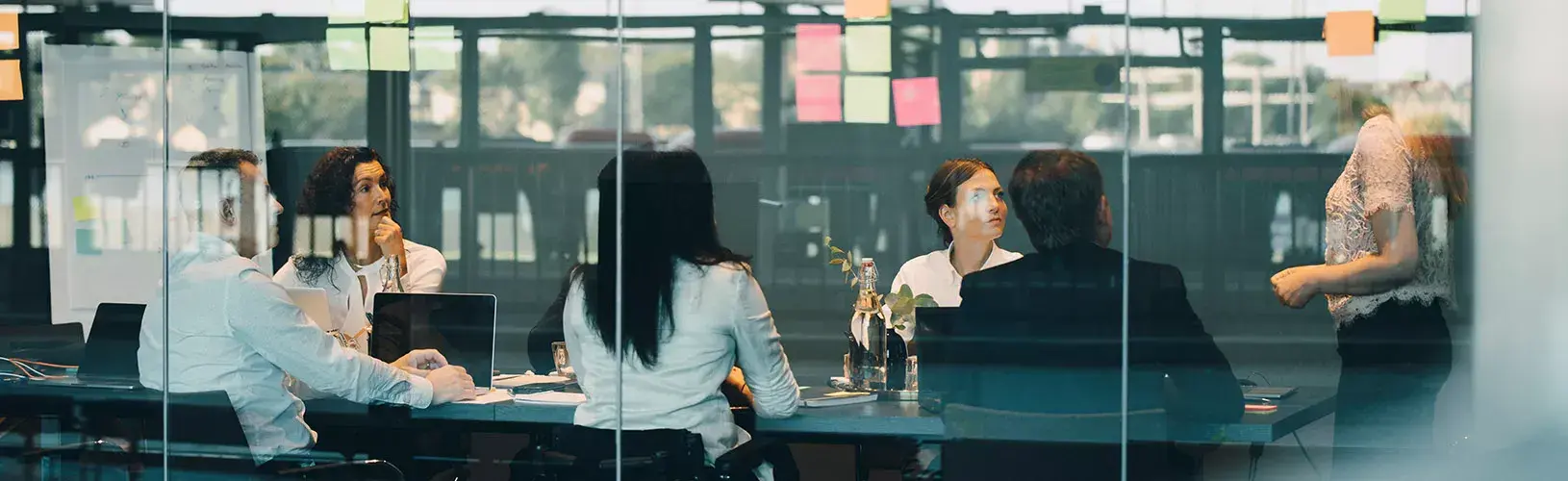 People discussing the consequences of noncompliance.